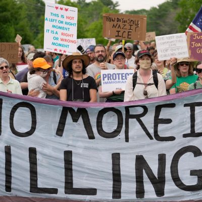 Protest over killing of driver by ICE officer in US